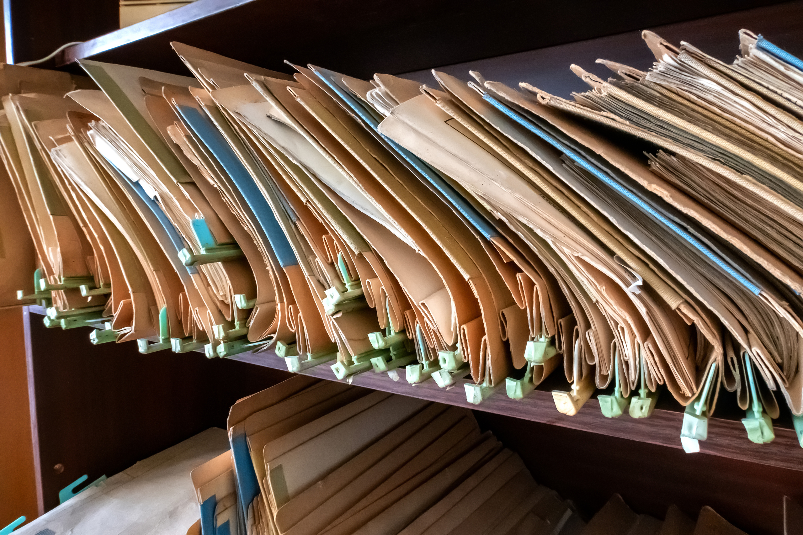 Old folders with documents in the library.
